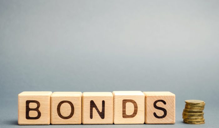 wooden-blocks-with-the-word-bonds-and-coins-2022-11-09-06-17-40-utc wooden-blocks-with-the-word-bonds-and-coins-2022-11-09-06-17-40-utc